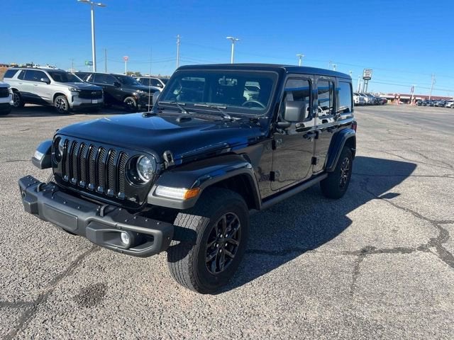 2023 Jeep Wrangler Freedom in Black Clearcoat — front three-quarter view