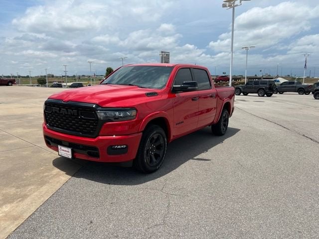 2025 RAM 1500 Big Horn in Flame Red Clearcoat — front three-quarter view