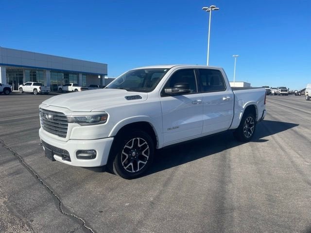 2025 RAM 1500 Laramie in Bright White Clearcoat — front three-quarter view