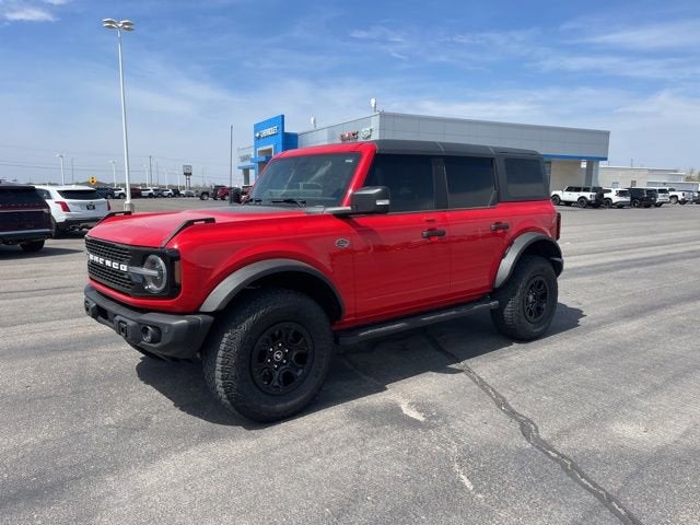 2023 Ford Bronco Wildtrak in Race Red — front three-quarter view