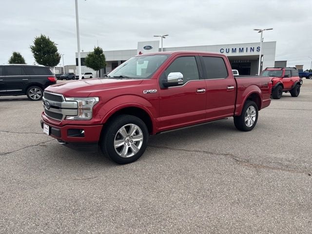 2020 Ford F-150 Platinum in Red Metallic — front three-quarter view