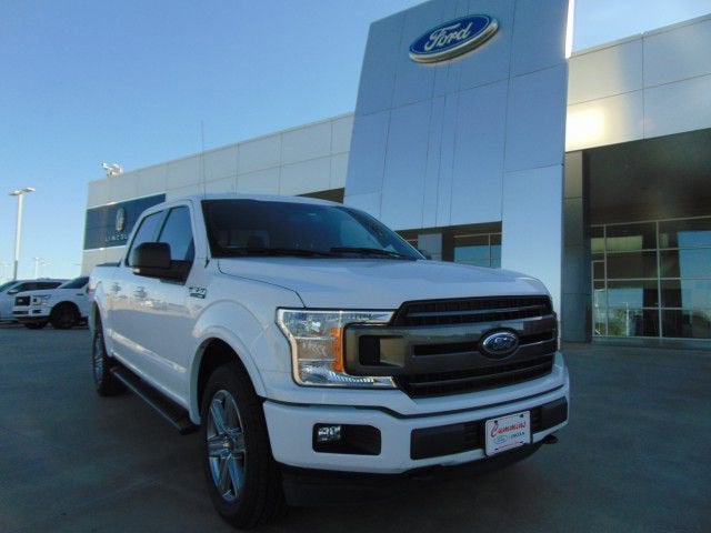 2018 Ford F-150 XLT in Oxford White — front three-quarter view