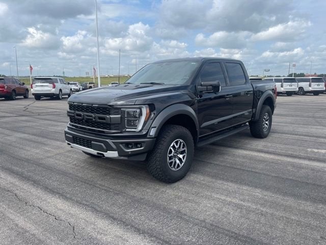 2023 Ford F-150 Raptor in Agate Black Metallic — front three-quarter view