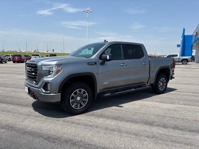 2021 GMC Sierra 1500 AT4 in Satin Steel Metallic — front three-quarter view