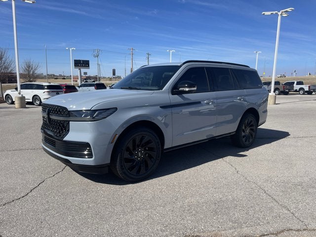 2026 Lincoln Navigator Reserve in Gray Mist Metallic Tri-Coat — front three-quarter view