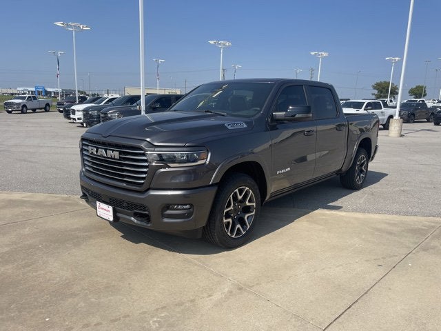 2026 RAM Ram 1500 RAM 1500 LARAMIE CREW CAB 4X4 5'7' BOX in Granite Crystal Metallic Clear-Coat Exterior Paint — front three-quarter view