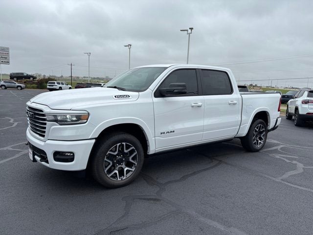 2026 RAM Ram 1500 RAM 1500 LARAMIE CREW CAB 4X4 5'7' BOX in Bright White Clear-Coat Exterior Paint — front three-quarter view