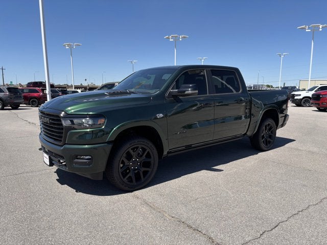 2026 RAM Ram 1500 RAM 1500 LARAMIE CREW CAB 4X4 5'7' BOX in Serrano-Green Metallic Exterior Paint — front three-quarter view