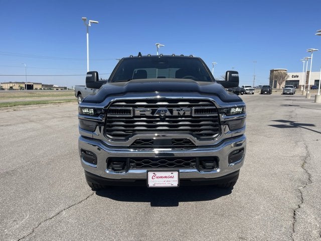 2026 RAM Ram 2500 RAM 2500 BIG HORN CREW CAB 4X4 6'4' BOX in Diamond Black Crystal Pearl-Coat Exterior Paint — front three-quarter view