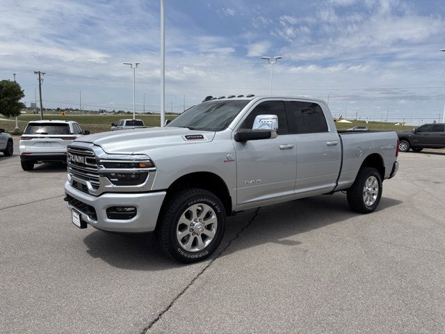 2026 RAM Ram 2500 RAM 2500 LARAMIE CREW CAB 4X4 6'4' BOX in Silver-Zynith Exterior Paint — front three-quarter view