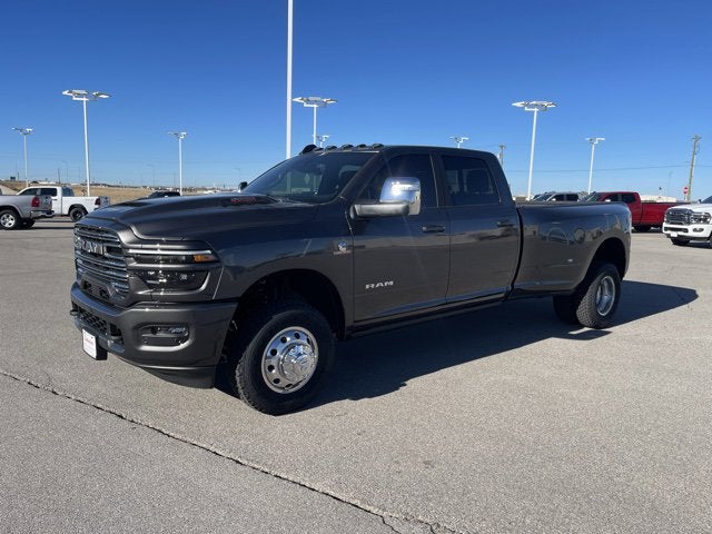 2026 RAM Ram 3500 RAM 3500 LARAMIE CREW CAB 4X4 8' BOX in Forged Blue Metallic Exterior Paint — front three-quarter view
