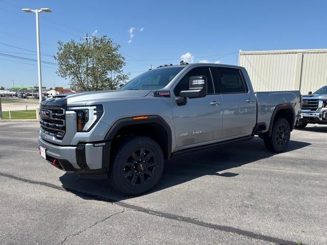 2026 GMC Sierra 2500 HD AT4 in Sterling Metallic — front three-quarter view