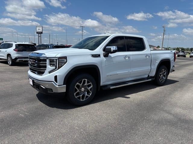 2026 GMC Sierra 1500 SLT in Glacier White Tricoat — front three-quarter view
