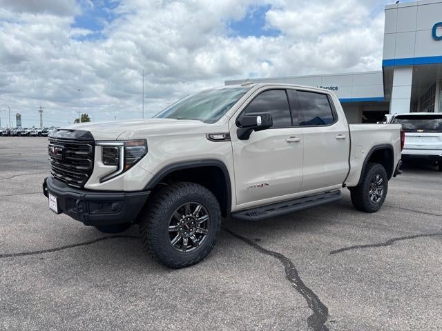 2026 GMC Sierra 1500 AT4X in Coastal Dune — front three-quarter view