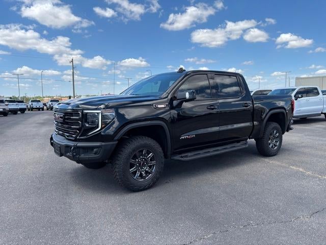 2026 GMC Sierra 1500 AT4X in Onyx Black — front three-quarter view